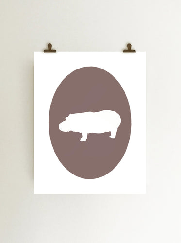 Hippopotamus cameo giclee art print in purple on white paper shown hanging with clips on wall