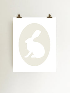 Ivory rabbit cameo giclee art print on fine art paper shown hanging on wall from clips